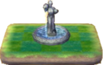 Fuente con estatua.png