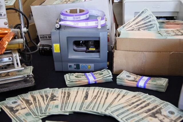 File:20140131counterfeit-american-bills-1.jpg
