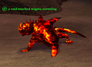 A void-touched magma wormling