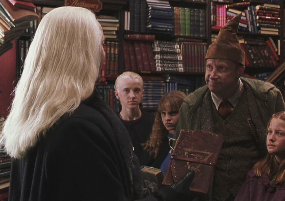 Draco, Lucius y Arthur.jpg