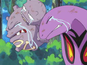 Arbok, a giant purple cobra, and Weezing, a two-headed purple globe, crying at the thought of parting from Jessie and Jane.