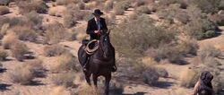 Reverend Kane on a horse