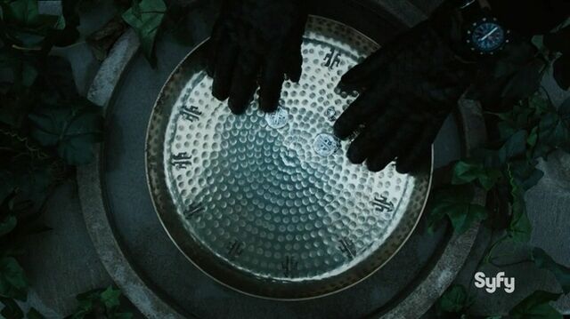 File:Merging the Amulet.jpg