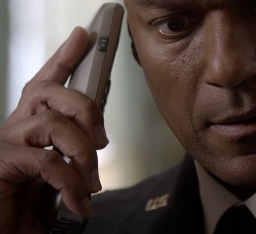 File:9x05 Coburn phone 2.jpg