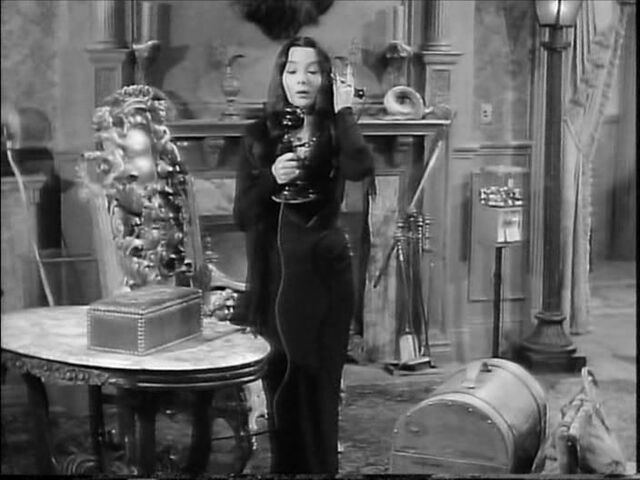 File:51.Morticia.and.Gomez.vs..Fester.and 044.jpg