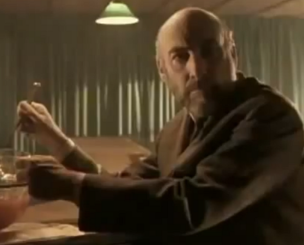 File:2whisperingbaldman.png