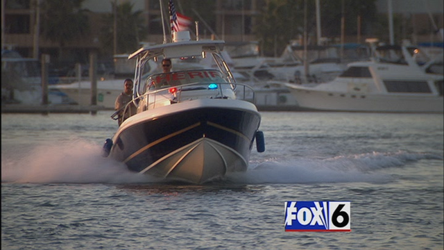 File:1x01 police boats.png