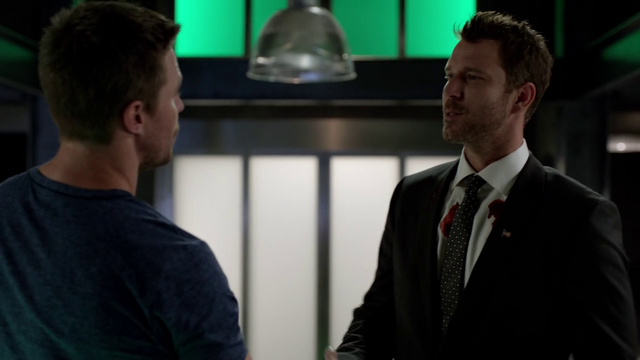 File:Christopher Chance introduces himself to Oliver Queen after faking the latter's death.png