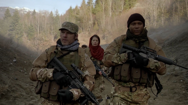 File:Diggle and Lyla in Afghanistan.png