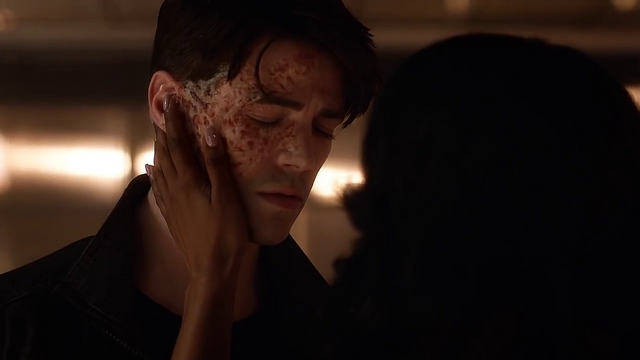 File:Iris touches Savitar's face.png