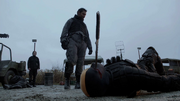 Slade Wilson stabs Billy Wintergreen in the eye.png