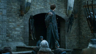 Theon Hangs Burnt Bodies.jpg