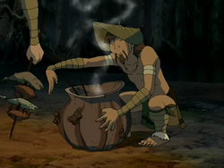 Foggy Swamp Tribesman cooking.png