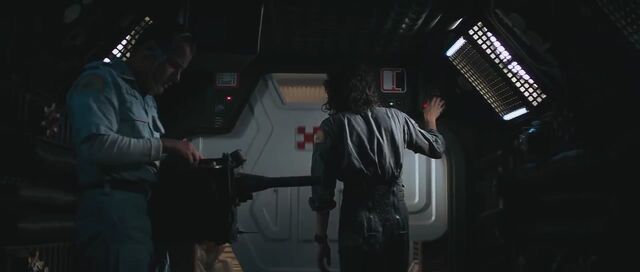 File:Ash holding a tracker.jpg