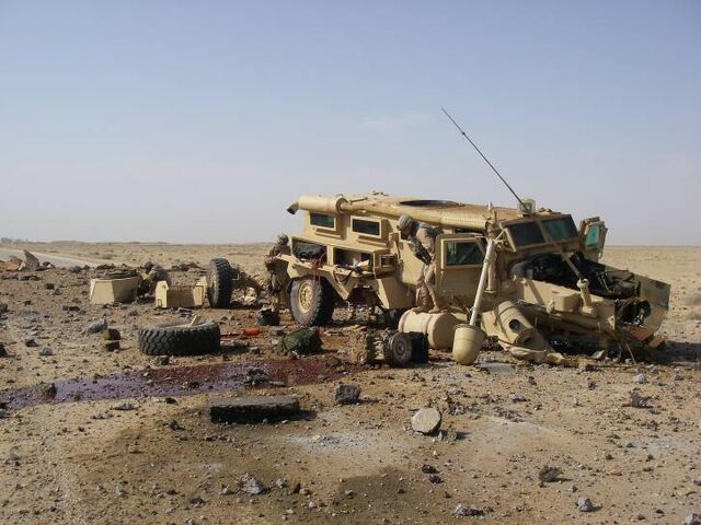 File:Cougar Hit By IED.jpeg