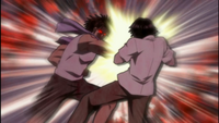 Tojo punches Izuma