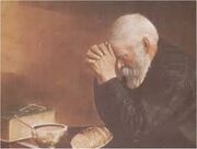 Old man giving thanks