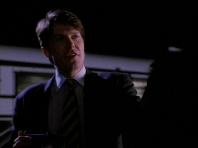 File:1x10-Rexaftertakingphoto.jpg