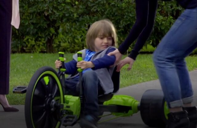 File:S06E02-Greg on green machine.jpg