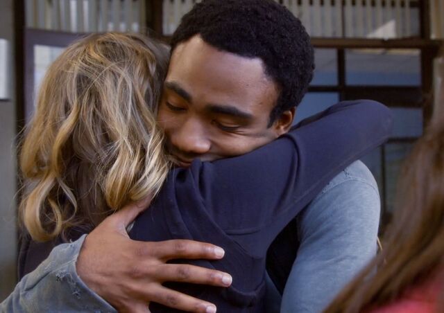 File:Troy hugs Britta.jpg