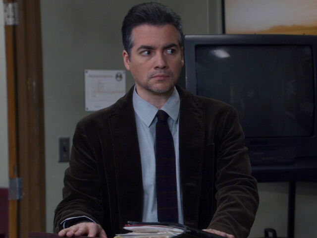 File:5x02-Garrity cageing.jpg