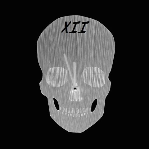 Datei:Blue-spoonful-skull-clock-700x700.jpg