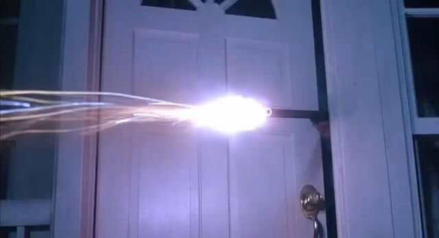 File:Critters-door-rifle-shot.jpg
