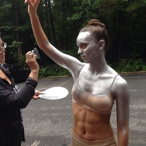 File:Payton silver body paint on set of High Hello.jpg