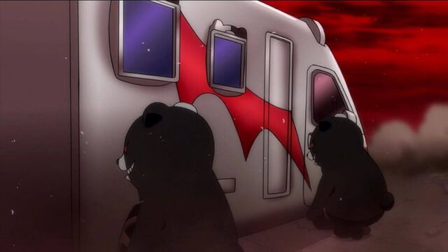 File:Monokuma carring a car.jpg