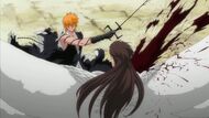 Ichigo slashes Aizen