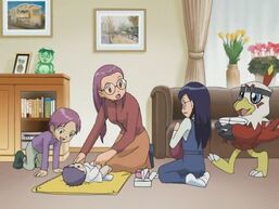 Yolei changing her baby's diapers