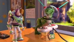 Buzz watching Rex play