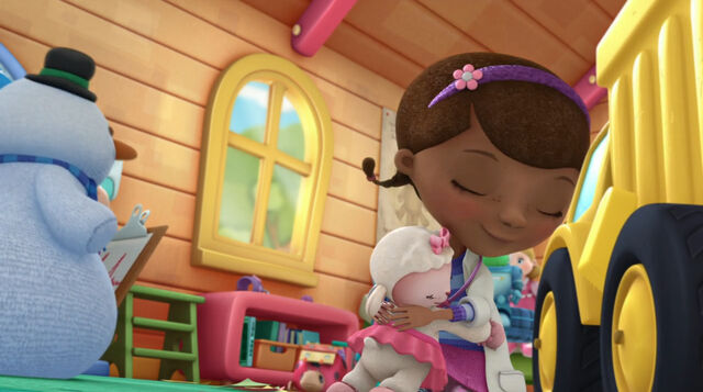 File:Doc and lambie cuddle.jpg