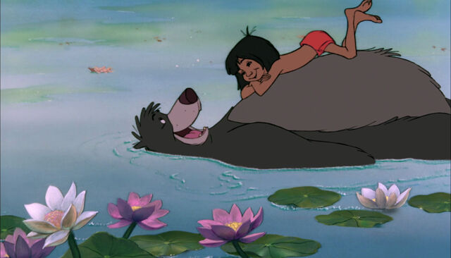 File:Mowgli and Baloo the bear are both relaxing on the river.jpg