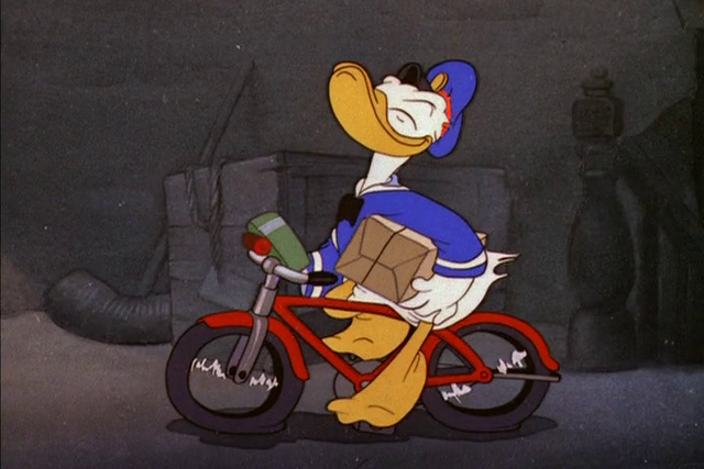 File:Donald riding a bicycle.png