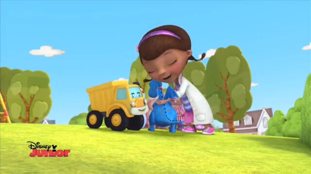 File:Doc and toys hug.jpg