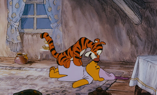 File:Tigger is sitting on Pooh Bear.jpg