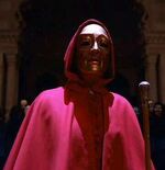 What hides behind the golden face?.