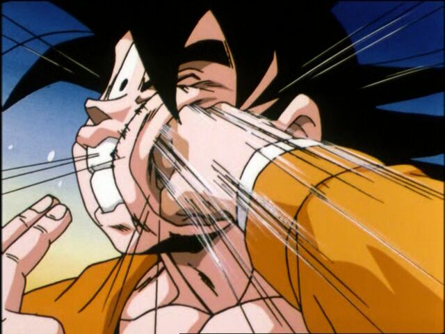 File:Krillin Sucker Punches Goku.jpg