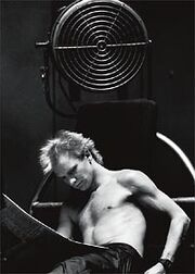 Sting half naked resting.jpg