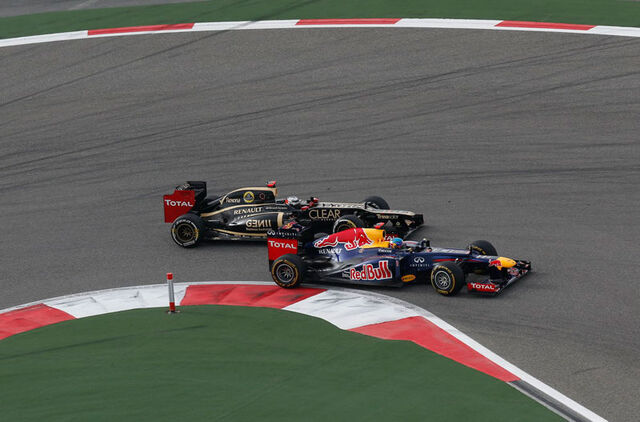 File:Raikkonen-vettel1-lg.jpg
