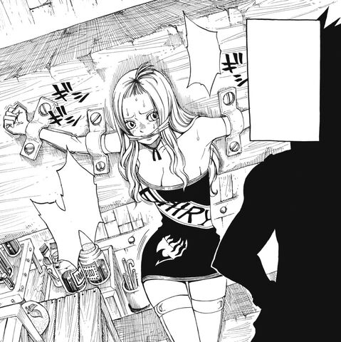 File:Mirajane chained by Gajeel.jpg