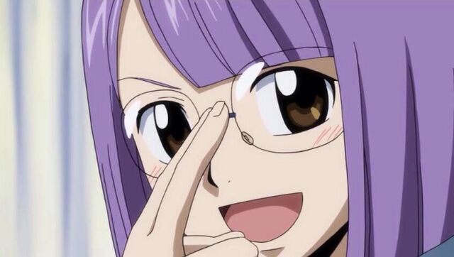 File:Laki smiling while fixing her glasses.jpg