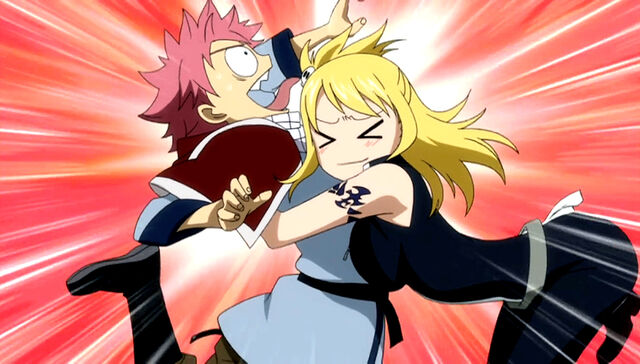 File:Lucy hugs Natsu.jpg