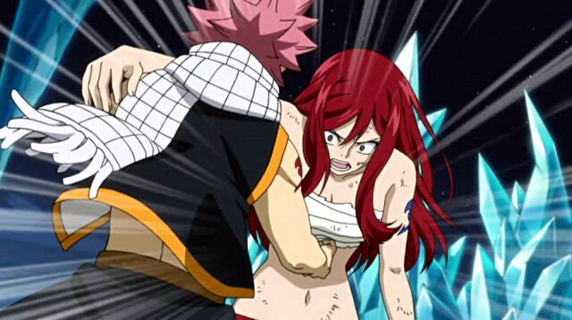 File:Natsu knocks Erza unconscious.jpg
