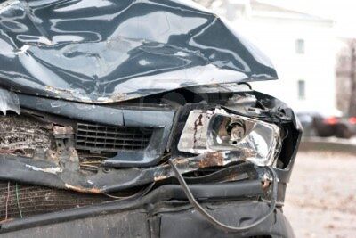 6034884-a-wrecked-car-lays-in-wait-after-a-vicious-car-accident