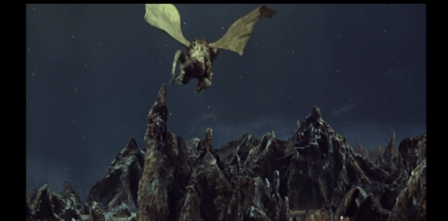 File:Ghidorah flees.png