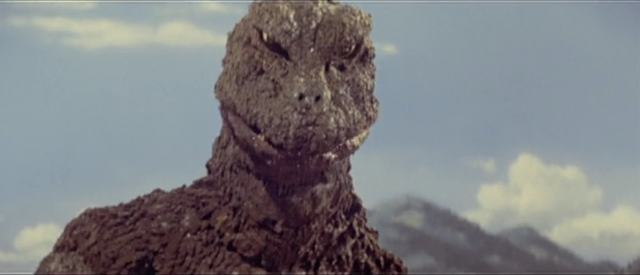 File:All Monsters Attack - Godzilla is interested in something.png