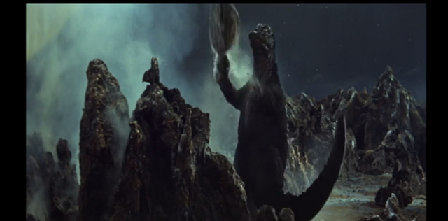 File:Godzilla throws a rock!.png