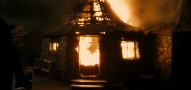 File:Hut on fire.jpg